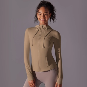 Close-up of khaki athletic hooded jacket with metal zipper and high-stretch nylon fabric