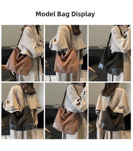 Detail view of large suede tote bag featuring reinforced leather corners and adjustable straps