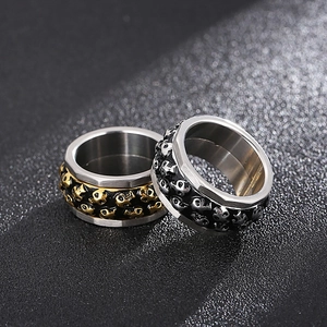 Punk rotatable double row skull rings in gold and silver finish stainless steel