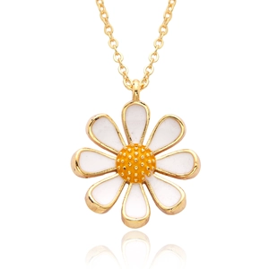 Golden necklace with a white and yellow daisy flower pendant on a white background
