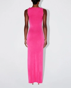 Rear view of sleek pink knit maxi dress highlighting the fitted back and sleeveless cut