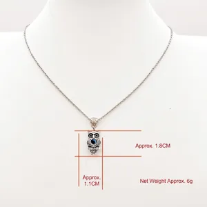 Silver owl evil eye pendant necklace with blue stone on a delicate cable chain