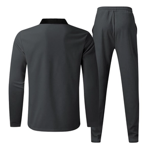 Detail view of men's dark gray waffle knit tracksuit set showing texture from the back