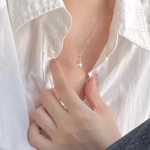Elegant 925 sterling silver pearl pendant necklace shown on a model for a refined look