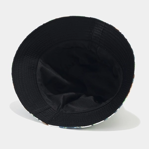 Reversible cartoon bucket hat with black lining and colorful pattern in main view