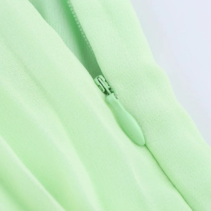 Elegant light green maxi skirt featuring a high-quality seamless invisible zipper closure