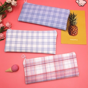 Three large capacity canvas pencil cases with colorful plaid patterns and heart zippers