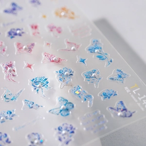 Holographic butterfly and rose nail art stickers with mini pearls and metallic finish