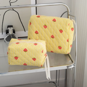 Quilted cotton strawberry print cosmetic bag set with yellow plaid and secure zippers