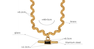 Detail showing dimensions of gold wavy chain and black rectangular glass pendant