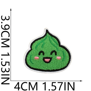 Close-up of green smiley face sushi embroidery patch with size dimensions in cm and inches