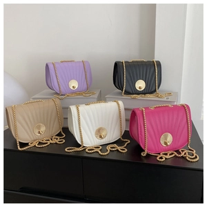 Selection of checkered saddle bags with pleated texture and shell-shaped gold clasps
