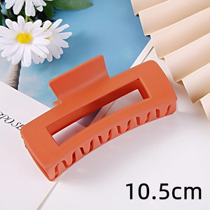 Matte orange rectangular hair claw clip detail, stylish minimalist hair accessory 10.5cm
