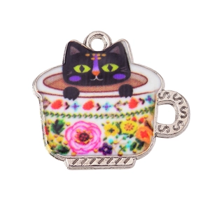 Detail of cartoon black cat in a floral teacup alloy pendant for DIY jewelry making