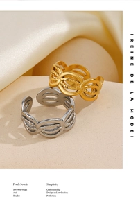 Detailed view of woven texture 18K gold and silver plated stainless steel rings