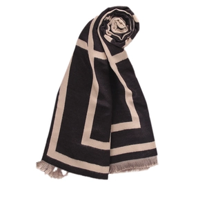 Thick geometric OM letter scarf in black and beige with soft tassels for winter warmth