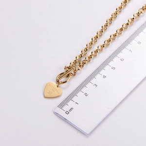 Detailed measurement of gold heart pendant with blueberry engraving and chain