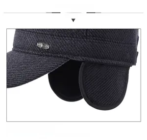 Detail of warm winter hat with ear flaps and woven texture for outdoor cold protection