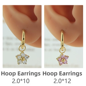 Detail of gold hoop earrings with plum blossom zircon pendants in 10mm and 12mm sizes