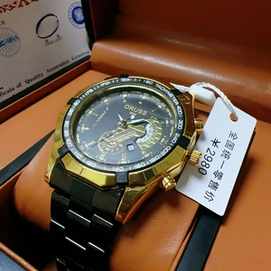 Macro view of ORUSS black and gold business watch with chronograph and date function