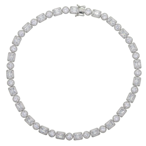 Iced out silver necklace with round and baguette cut zircons in a circular layout