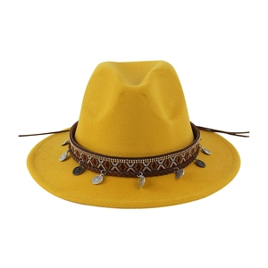 Bright yellow felt fedora hat with ethnic woven band and metallic coin pendants for unisex
