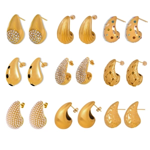 Set of nine gold-plated stainless steel teardrop stud earrings with cubic zirconia