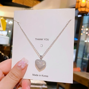 Elegant heart pendant necklace with micro-pave cubic zirconia on silver O-chain