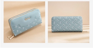 Blue PU leather long wallet with double gold zippers and embossed floral pattern