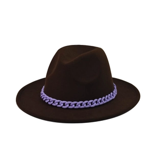 Detail of coffee felt fedora hat featuring a chunky purple chain decorative band