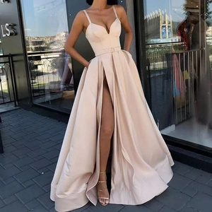 Elegant champagne satin evening gown with thin straps, deep V-neck, and a high side slit