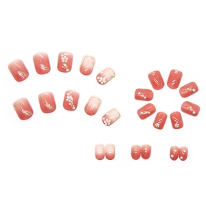 Pink gradient press-on nails with 3D embossed camellia, pearls and gold foil accents