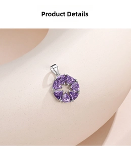 Macro shot of purple cubic zirconia gemstone pendant with a floral silver setting