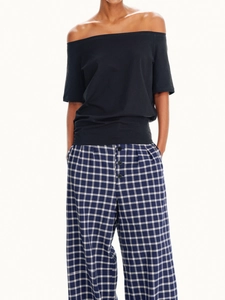 Women's off-shoulder black T-shirt and blue plaid wide-leg lounge pants set