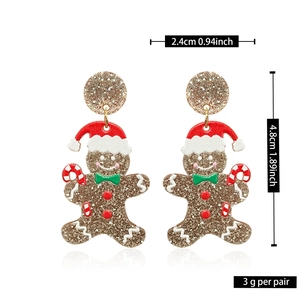 Detailed view of brown gingerbread man acrylic earrings with size and weight info