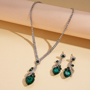 Luxury two-piece jewelry set with green heart-shaped gemstones and sparkling rhinestones