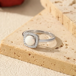 Chic S925 sterling silver ring with round opal center and square cubic zirconia halo