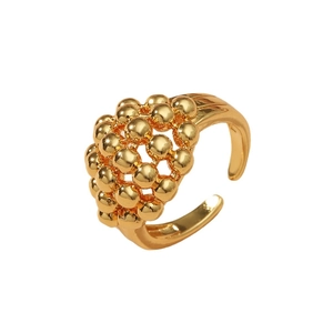 Adjustable warm gold open ring featuring a unique cluster of spherical beads on white background