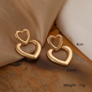 Detailed size view of 18K gold plated double heart earrings measuring 4cm by 2.6cm
