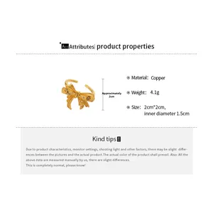 Detailed size specifications for a gold bow open ring with cubic zirconia stones