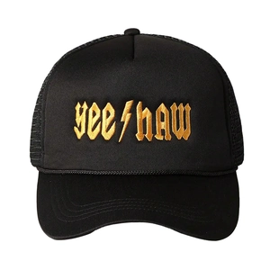 Black Y2K trucker hat with golden YEE HAW embroidery and rope detail on white background