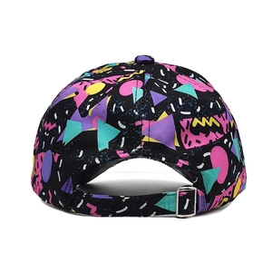 Detail of adjustable silver metal buckle and colorful geometric print on baseball cap