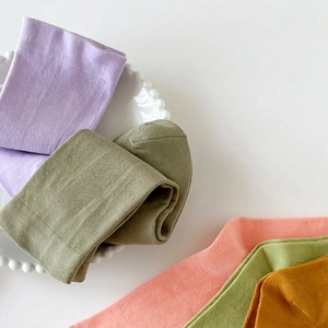 Pastel color seamless cotton mid-calf socks with breathable ribbed texture for women