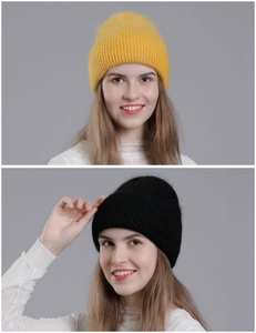 Detail of ribbed knit texture on rabbit fur hats in yellow and black colors