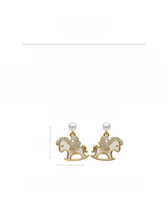 Detail of 14k gold plated horse earrings with zircons, shell and S925 silver pins