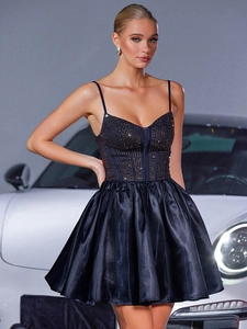 Navy sequin rhinestone corset dress with tiered satin skirt and luxury car background