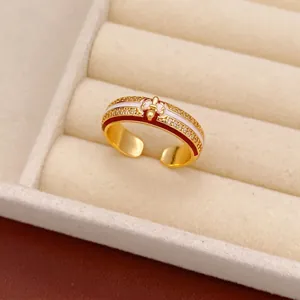 18k gold plated adjustable ring with red and white enamel and sparkling zircons