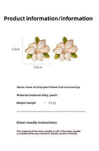 Detail of vintage floral pearl earrings with dimensions 2.5cm and material information