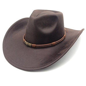 Detail view of brown suede cowboy hat featuring braided leather bands and metal shield emblem