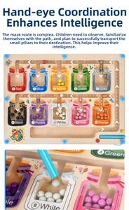 Close-up of magnetic pen guiding colorful beads in wooden number and color sorting maze
